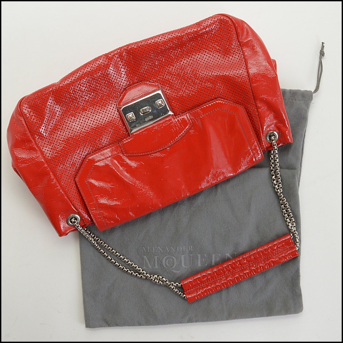 RDC14646 ALEXANDER MCQUEEN Red Patent Perforated Flap Bag