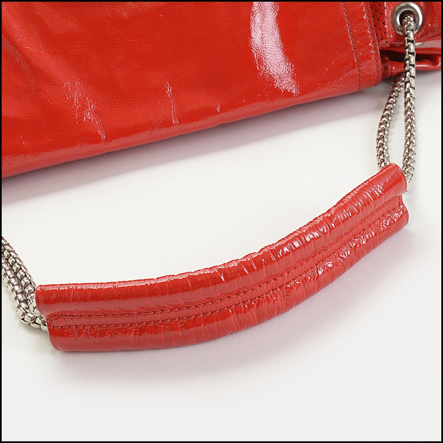 RDC14646 ALEXANDER MCQUEEN Red Patent Perforated Flap Bag
