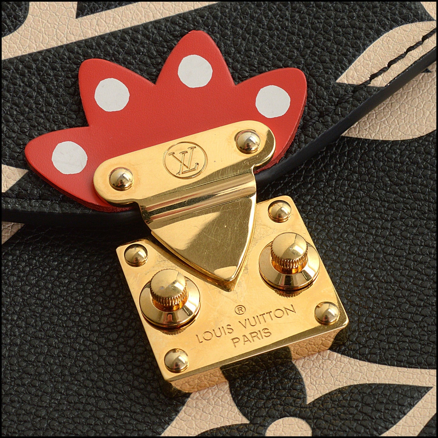 RDC14930 LOUIS VUITTON 2020 Black/Creme Empreinte Giant Monogram Crafty Pochette Metis