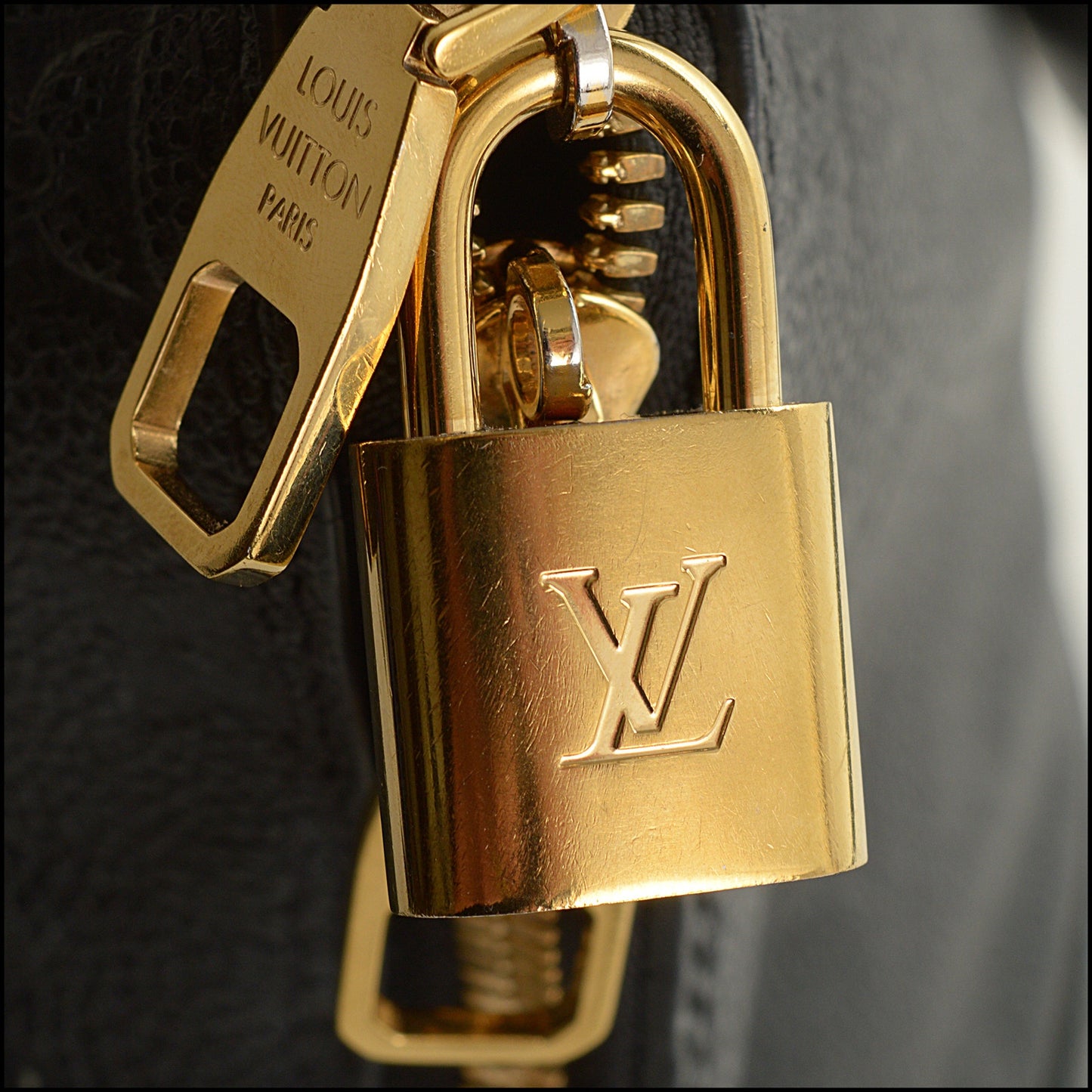 RDC15469 LOUIS VUITTON Black Empreinte Monogram Leather Neo Alma