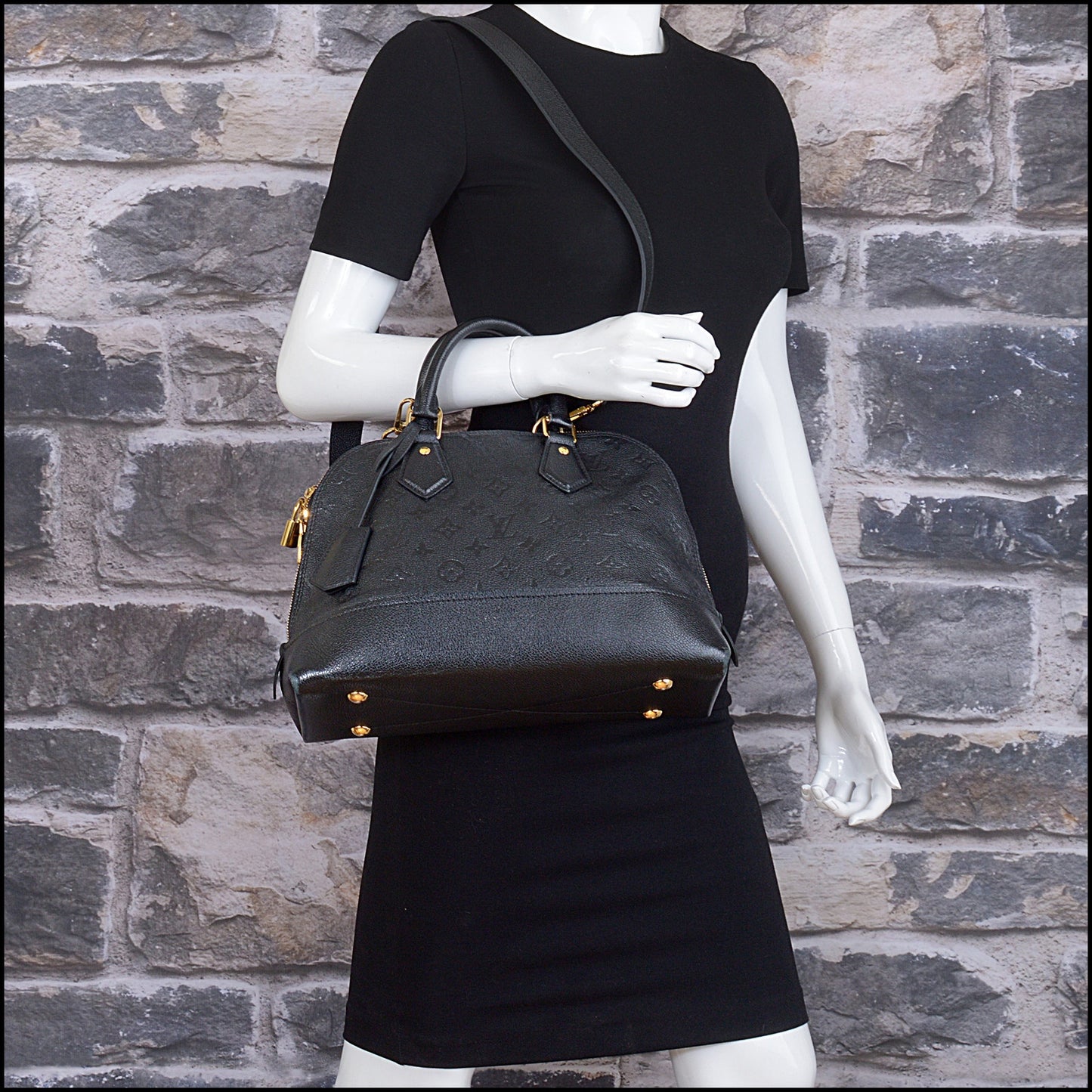 RDC15469 LOUIS VUITTON Black Empreinte Monogram Leather Neo Alma