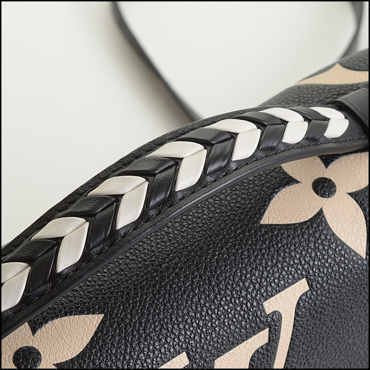 RDC14930 LOUIS VUITTON 2020 Black/Creme Empreinte Giant Monogram Crafty Pochette Metis