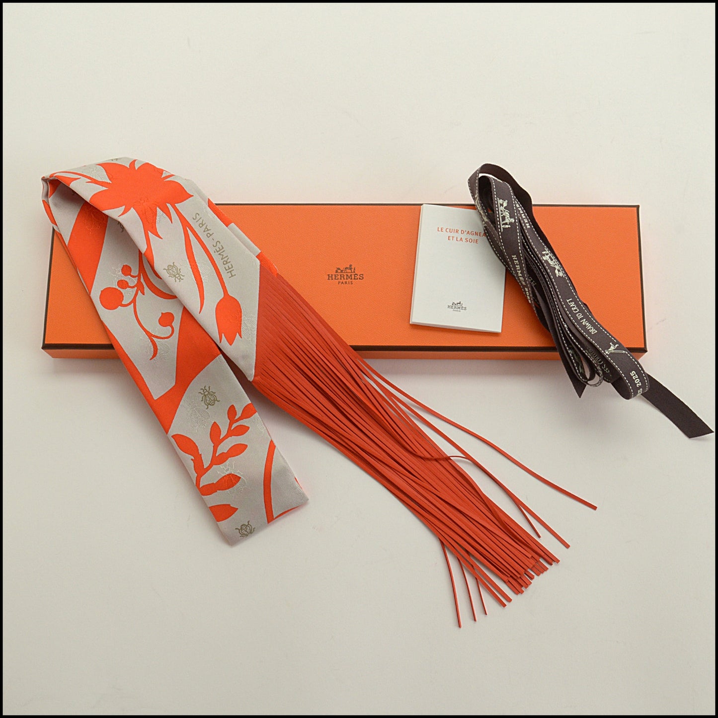 RDC15239 HERMES Vermillion and Gris Perle Bouquet Final Leather Fringe Twilly