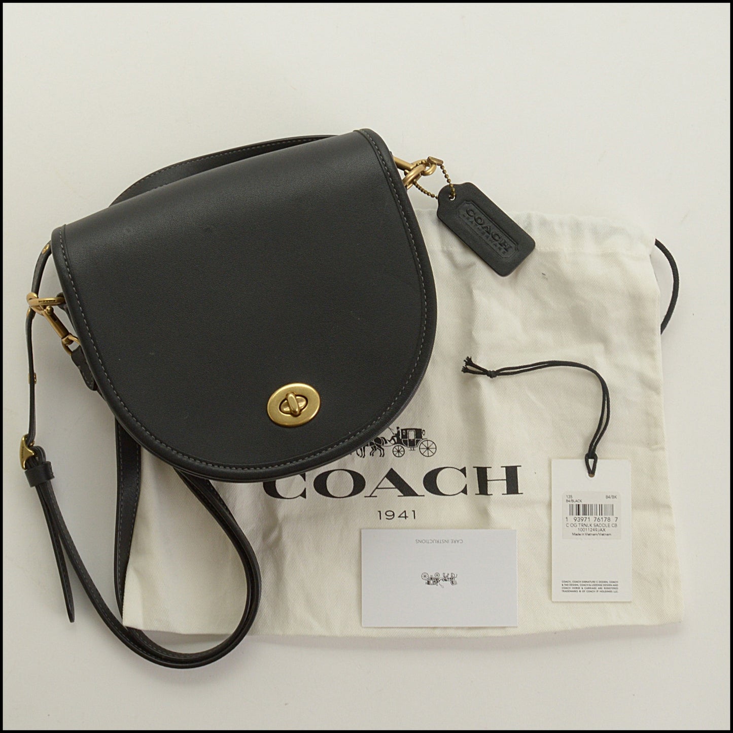 RDC15450 COACH Black Glove Tanned Leather Turn Lock Mini Saddle Bag