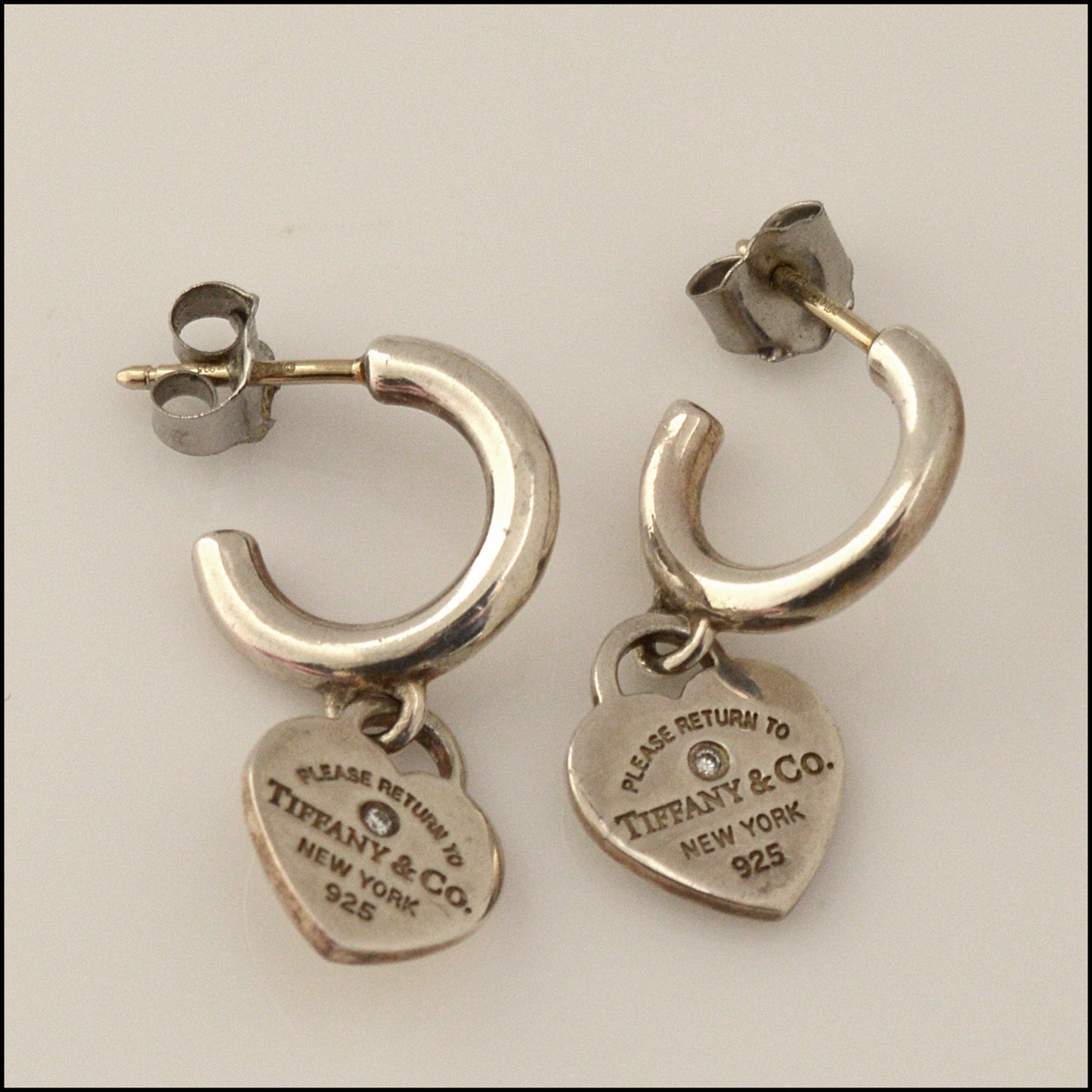 RDC15007 TIFFANY & CO. Sterling Silver Mini Heart Diamond "Return to Tiffany" Hoop Earrings