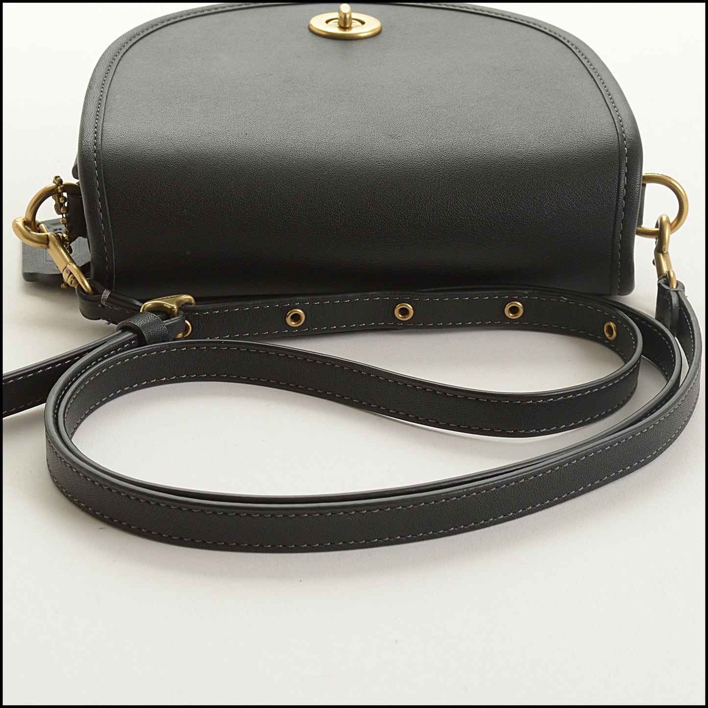 RDC15450 COACH Black Glove Tanned Leather Turn Lock Mini Saddle Bag