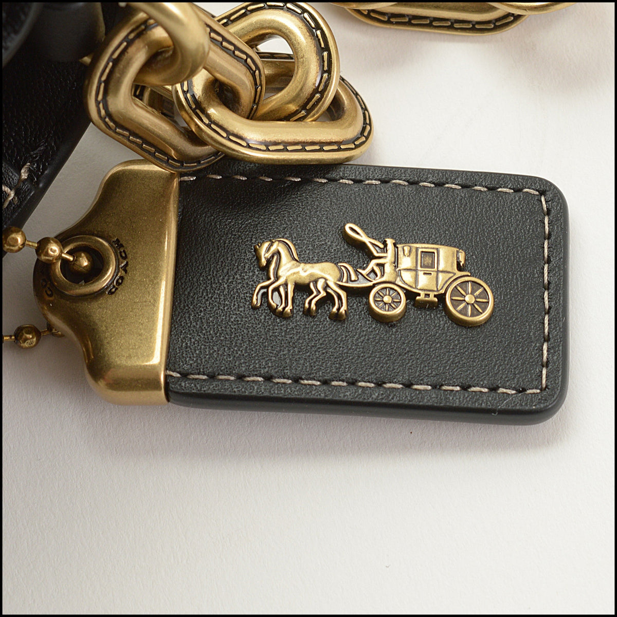 RDC15648 COACH Salt Stone Canvas/Black Leather Idol Bag
